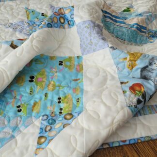 baby quilt with animal prints and soft minky back