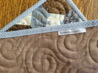 showing back of mini quilt