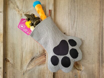 pet paw stocking filled with toys. toys not included